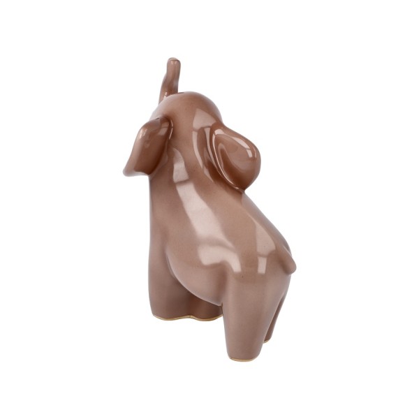 Goebel „Kiombo“ – Elephant de Luxe е изящна порцеланова фигура, вдъхновена от реалния осиротял слон Kiombo, за когото Goebel поема патронаж през 2022 г. Топлите тонове, деликатните растителни мотиви и фините кристални акценти превръщат 15,5-сантиметровата фигура в елегантен символ на сила, мъдрост и надежда. Част от приходите от серията Elephant подкрепят инициативи за защита и грижа за африканските слонове.